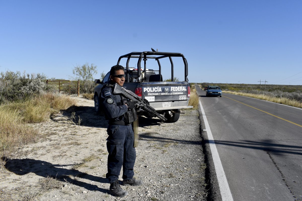 Meican police guarding highway
