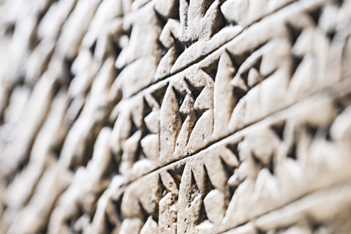 Ancient cuneiform script on a stone tablet