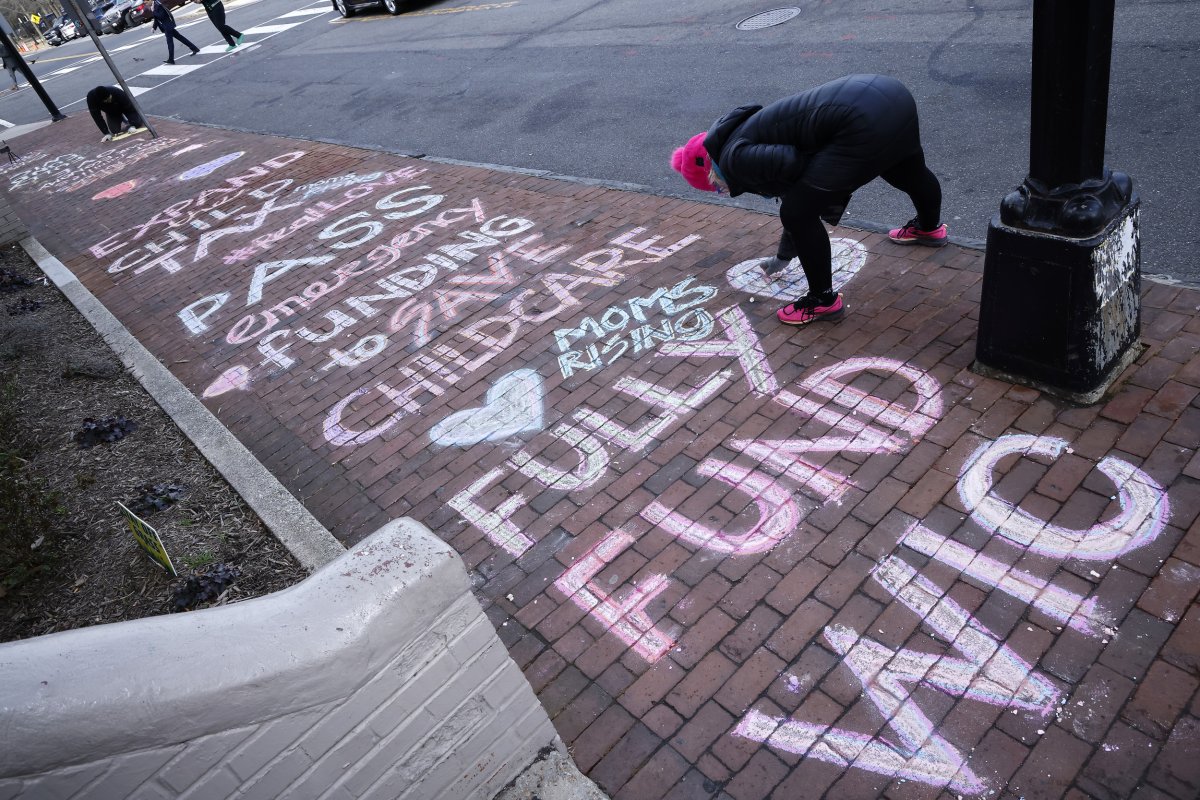 child taxMomsRising sidewalk art asks lawmakers to