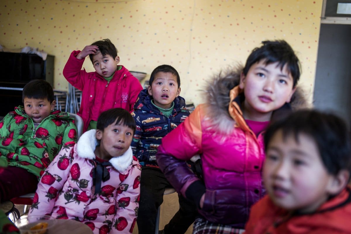 Chinese Children Watch TV in Orphanage