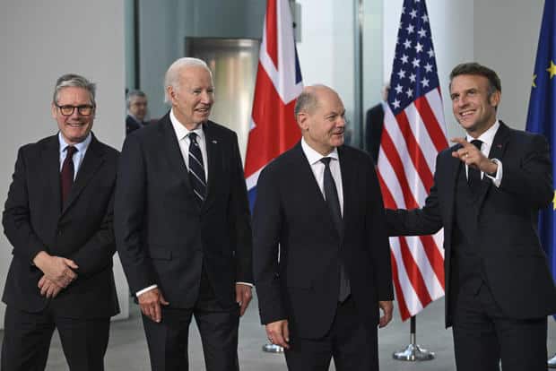 President Biden meets with French President Emmanuel Macron, British Prime Minister Keir Starmer and German Chancellor Olaf Scholz in Berlin on Oct. 18, 2024.
