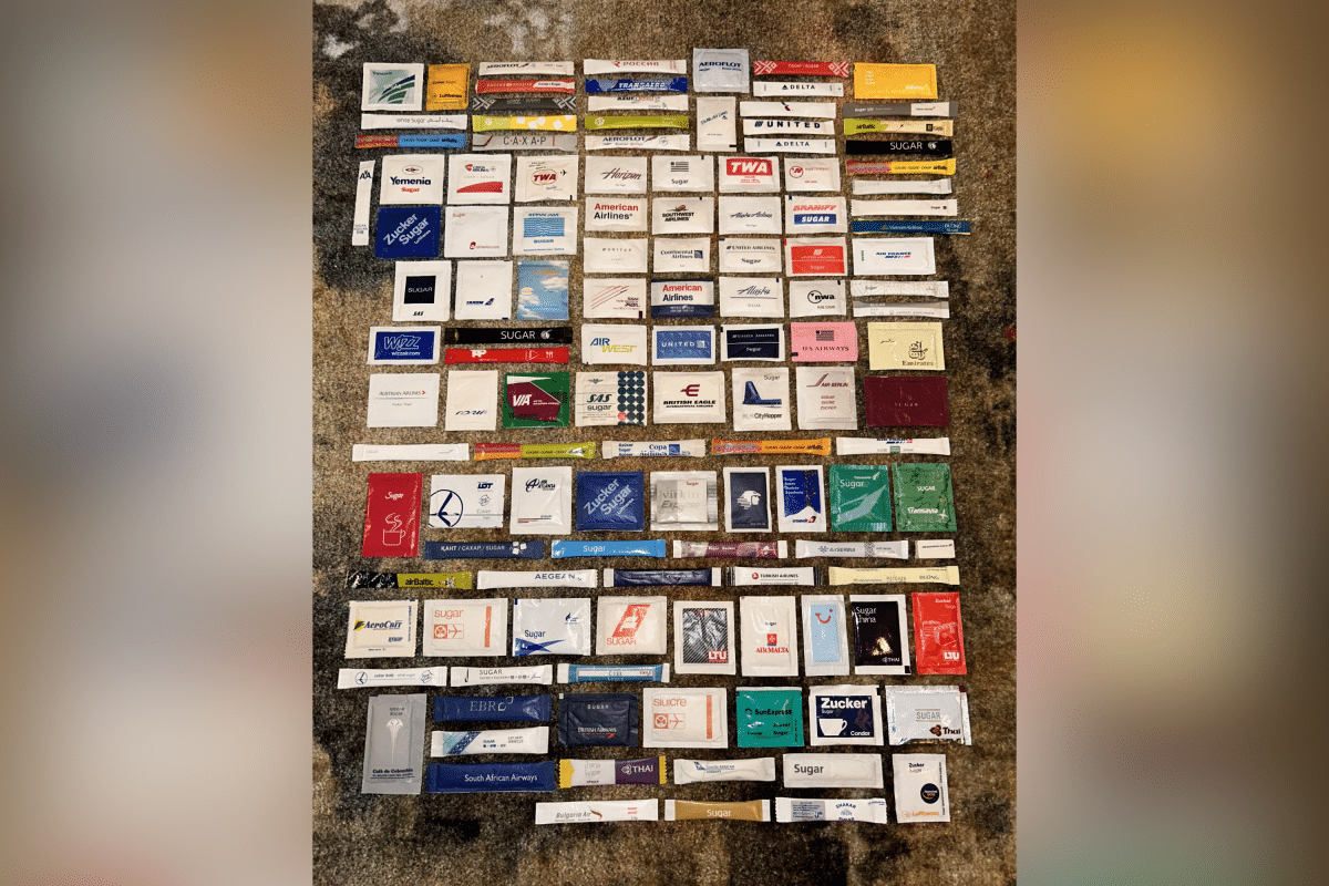 A man's collection of sugar packets.