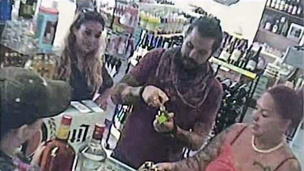 Throuple at liquor store