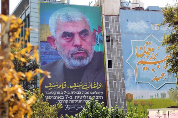 Posters featuring Hamas' new political chief Sinwar in Tehran