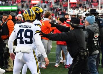 Police use pepper spray when brawl breaks out after Michigan upsets Ohio State
