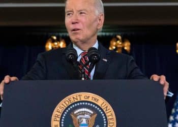 Biden signs defense bill, despite ban on transgender health care for military kids