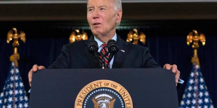 Biden signs defense bill, despite ban on transgender health care for military kids