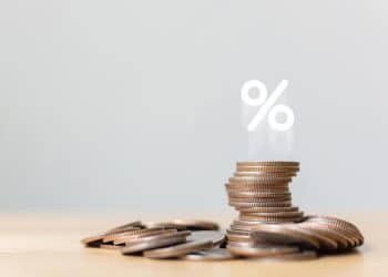 How are credit card interest charges compounded?