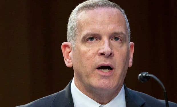 Acting FBI chief unexpectedly retires as Trump’s pick awaits confirmation