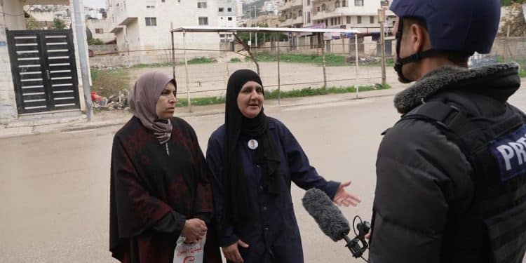 Palestinians and Israelis react to halt of hostage release and fragile ceasefire