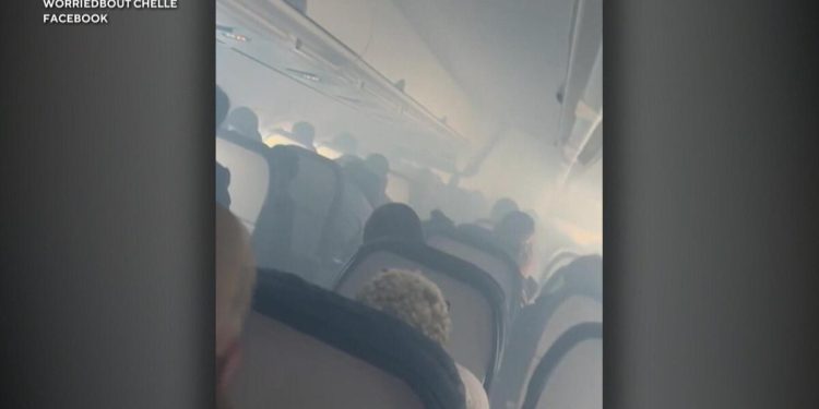 Passengers react to Delta flight’s emergency landing after cabin fills with smoke