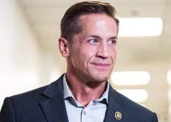 Angry voters confront Republican congressman over DOGE cuts at town hall