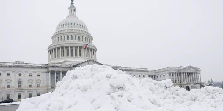 Winter storms threaten millions of people on both coasts