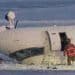 Delta plane crash survivor described hanging upside down after Toronto landing