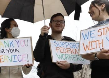 Protests at USAID building as workers pack up their desks, cuts take effect