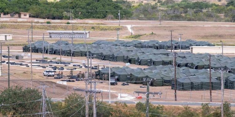 U.S. sending “low-risk” migrants to Guantanamo, despite vow to send “the worst”