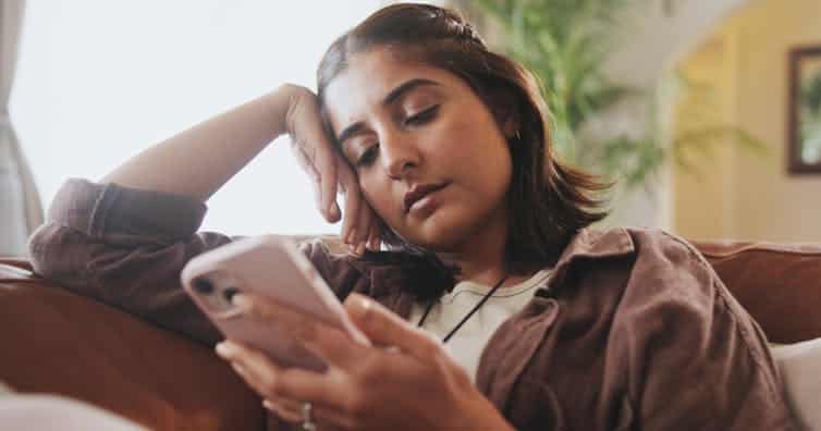 Woman scrolling on a phone
