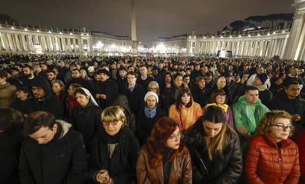 Thousands pray for ailing Pope Francis in chilly, rainy St. Peter’s Square