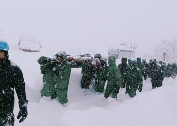 Dozens of workers missing after avalanche sweeps away their camp