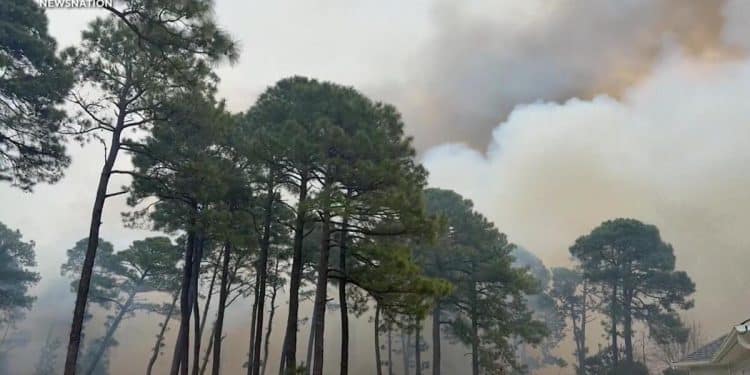 Wildfires erupt across the Carolinas forcing some to evacuate