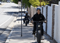 Is this high speed vehicle going the wrong direction on the sidewalk a bicycle or a jeopardy to pedestrians?