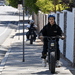 Is this high speed vehicle going the wrong direction on the sidewalk a bicycle or a jeopardy to pedestrians?